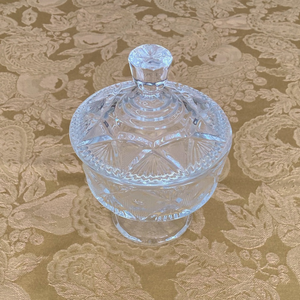 Footed glass candy dish with lid